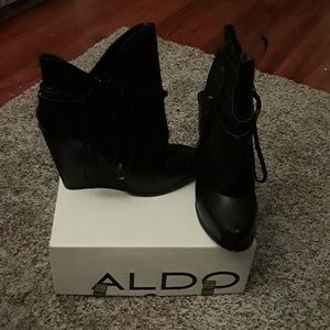 Never worn low wedge heel boots